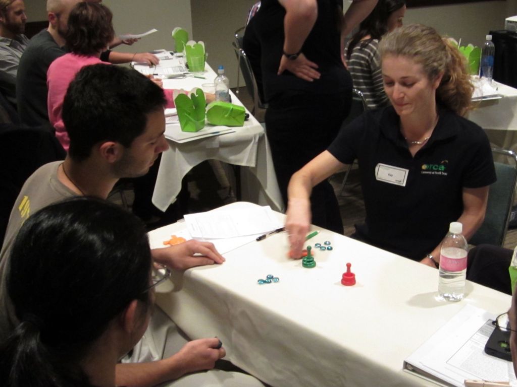 ORCA Member demonstrating concepts to a small group at a workshop